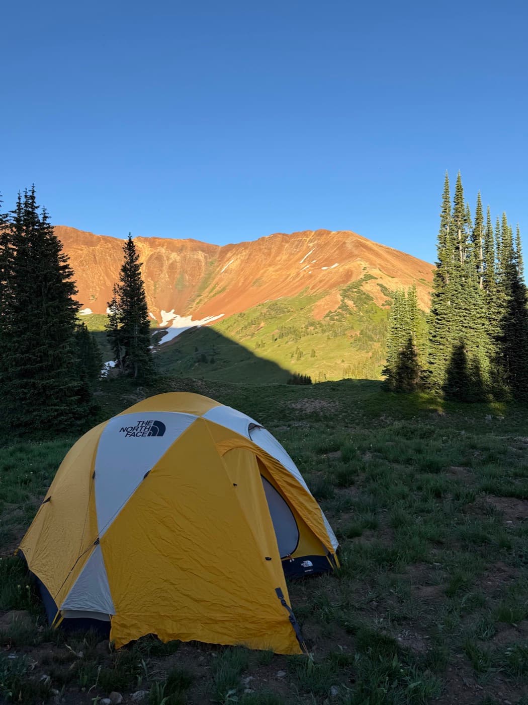Backcountry camping below an alpine ridge